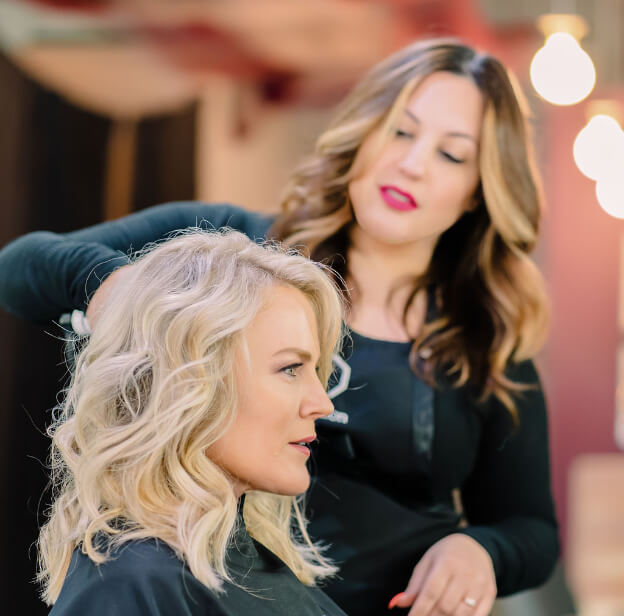 Lyndsey Kincer,-cutting client-hair-duality-salon austin, texas